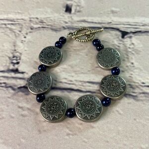 7.5 sterling silver aztec style bracelet.